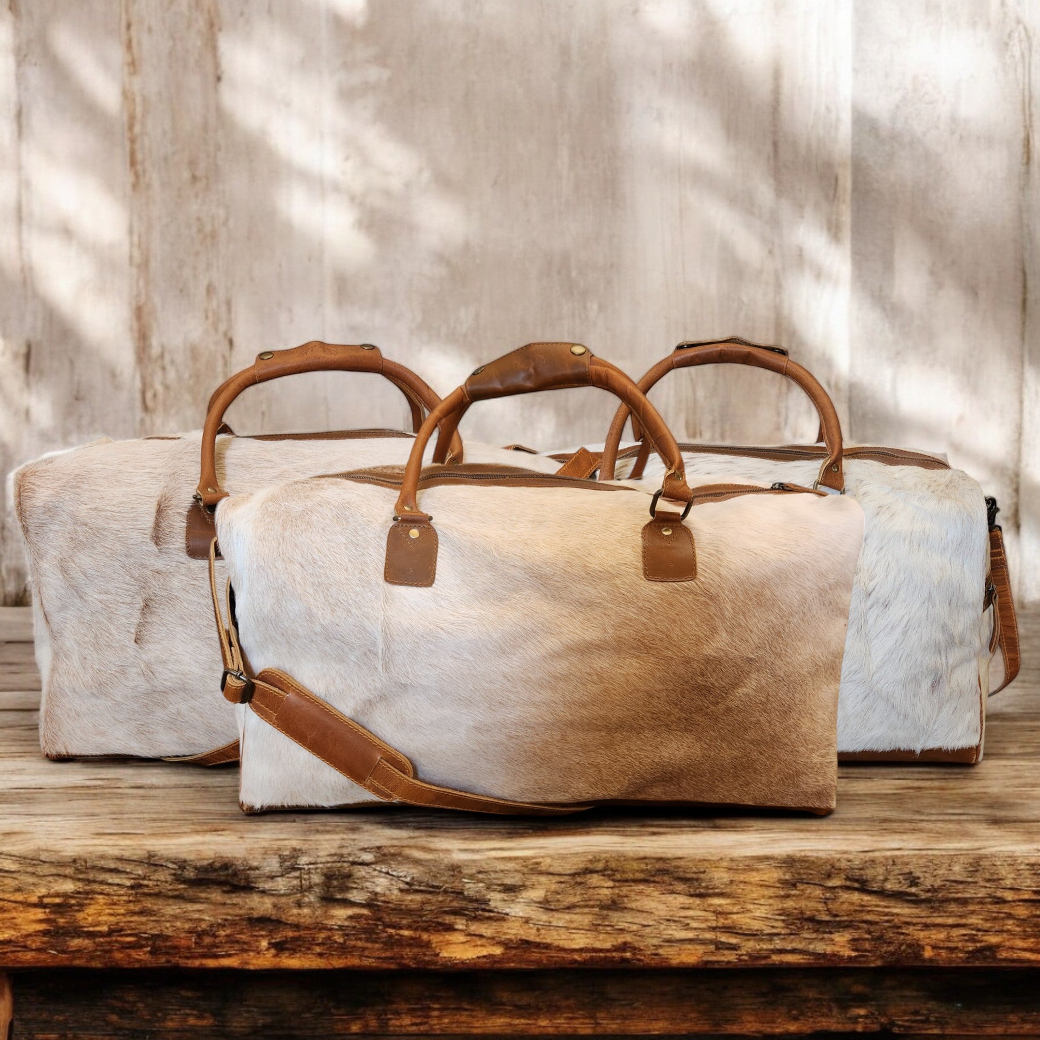 Cowhide weekender bag on sale